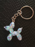 Porte clef petit chien ballon