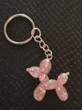 Porte clef petit chien ballon